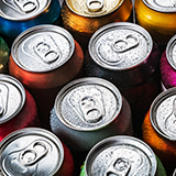 Row of soda can tops